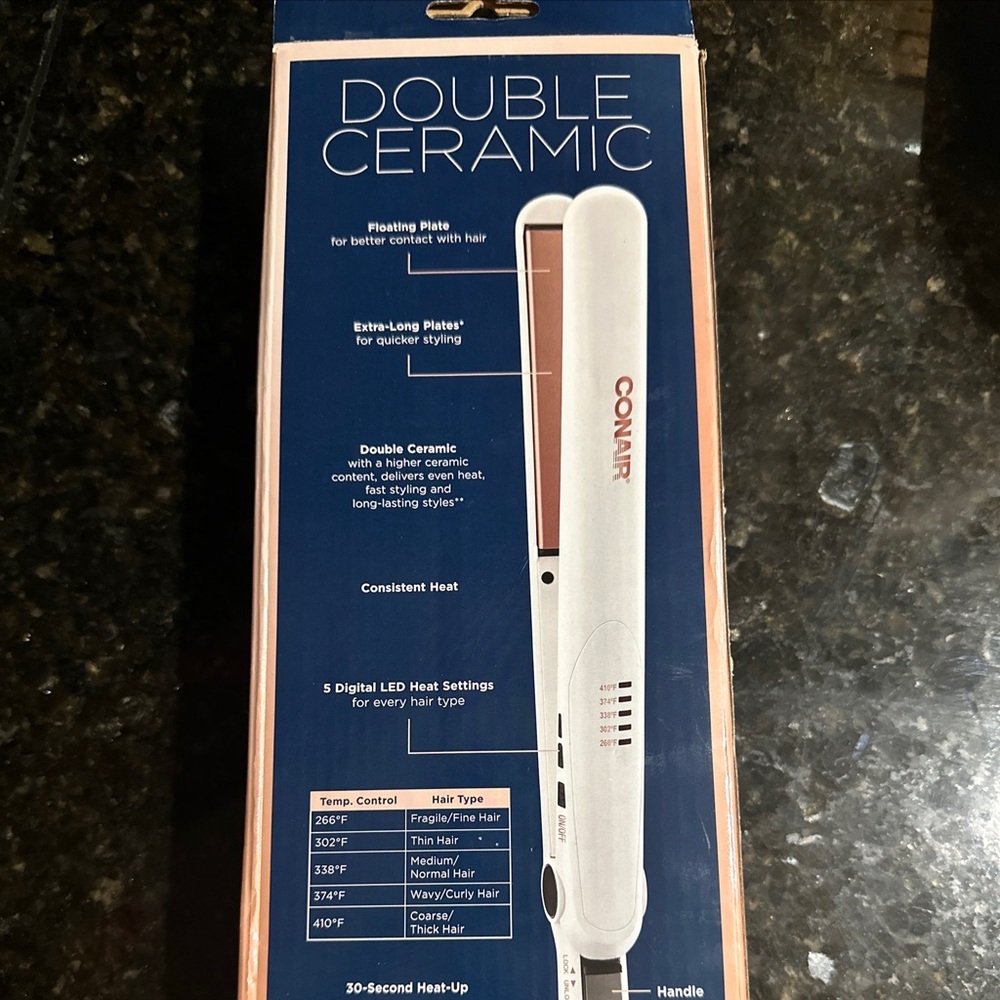 Open box, never used. Double ceramic con-air straighter